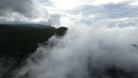 above the clouds and mountains in the north of bali, indonesia