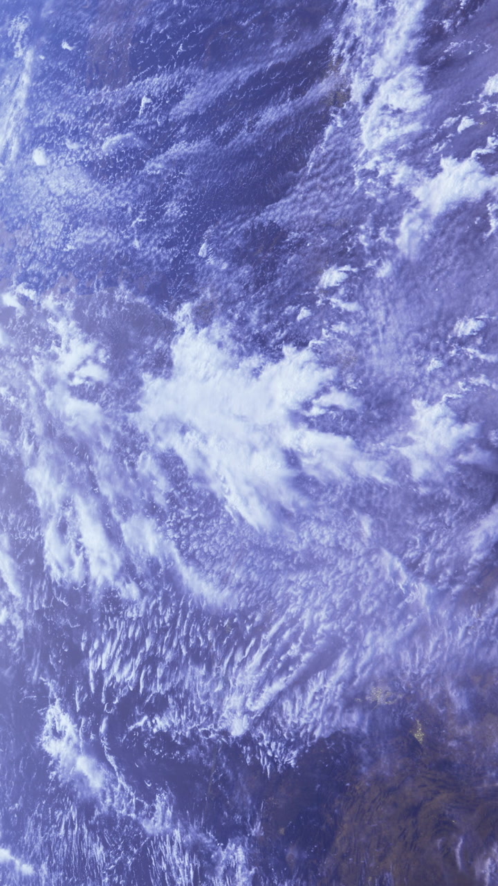 Swirling clouds over the ocean at twilight showcase natures beauty