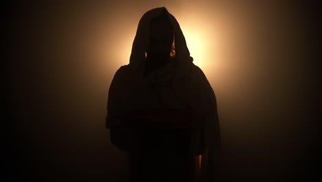 jesus silhouette in a dramatic light