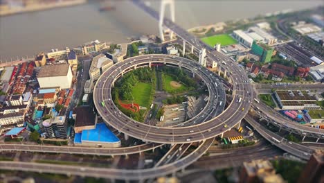 sunny day shanghai city famous traffic round road junction aerial panorama 4k tilt shift china