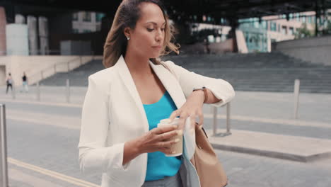 Beautiful-mixed-race-business-woman-walking-through-city