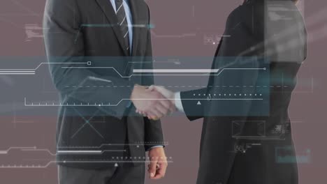 Data-processing-over-mid-section-of-businessman-and-businesswoman-shaking-hands