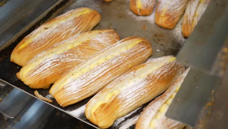 freshly baked bread lies on the shelves ready for sale