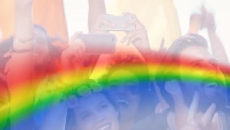 animation of rainbow over group of happy people