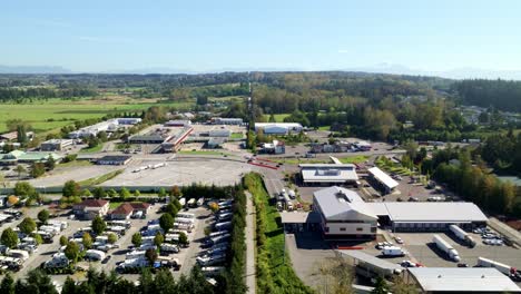 vehicles navigate through several checkpoint lanes at the bustling border crossing between south surrey, bc, and blaine, wa - drone flying forward