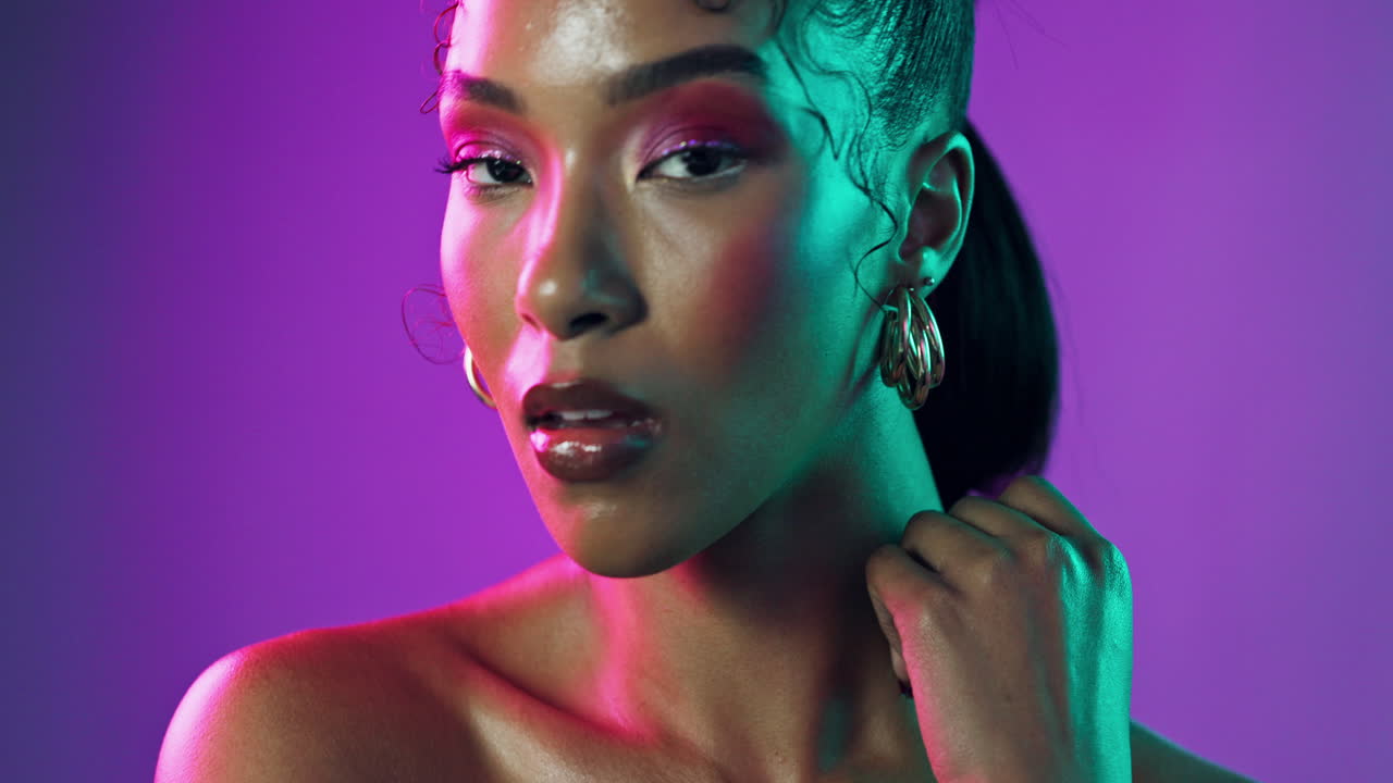Radiant Woman in Neon Lighting