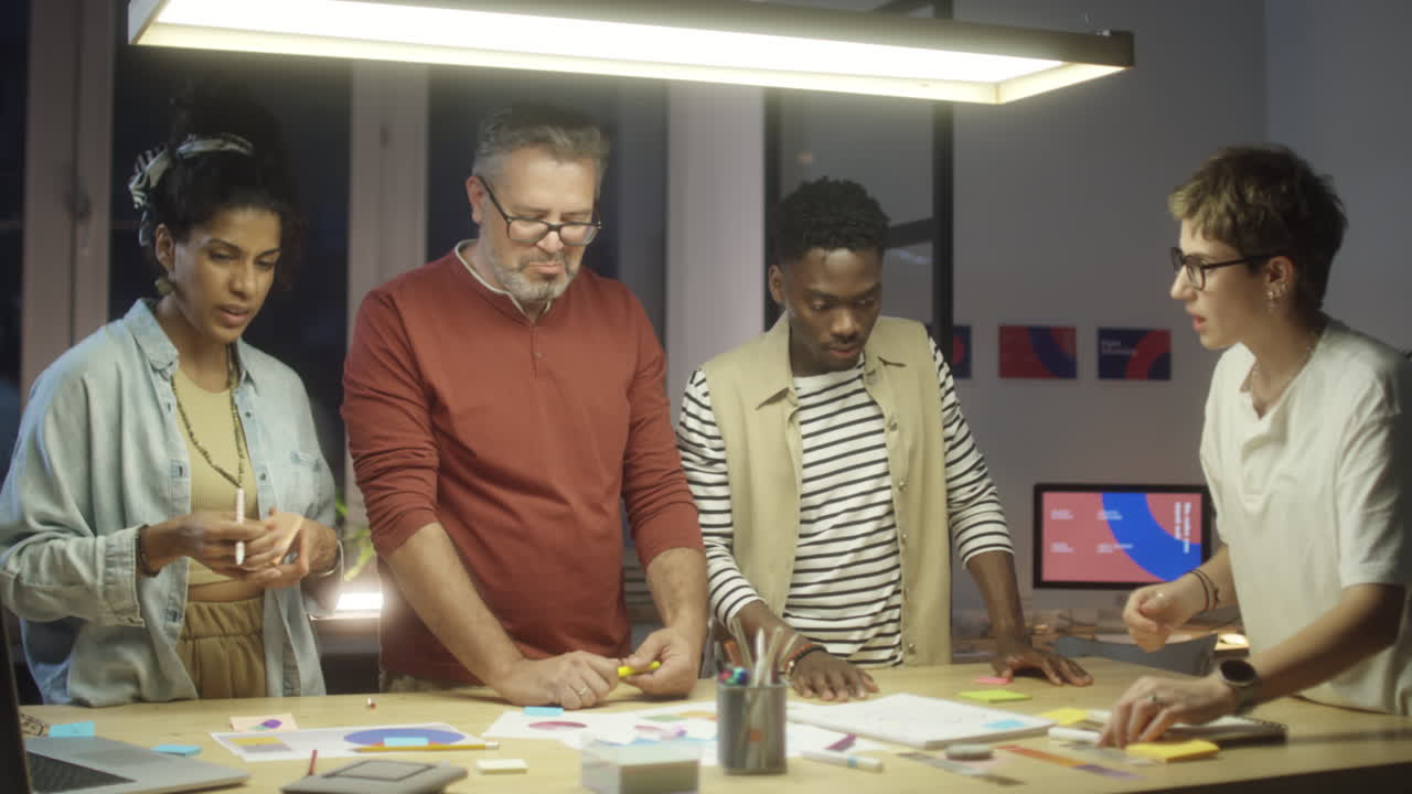 Team Working Together in Night Office