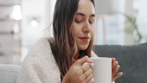 Sick-woman-drinking-tea-in-home-for-flu