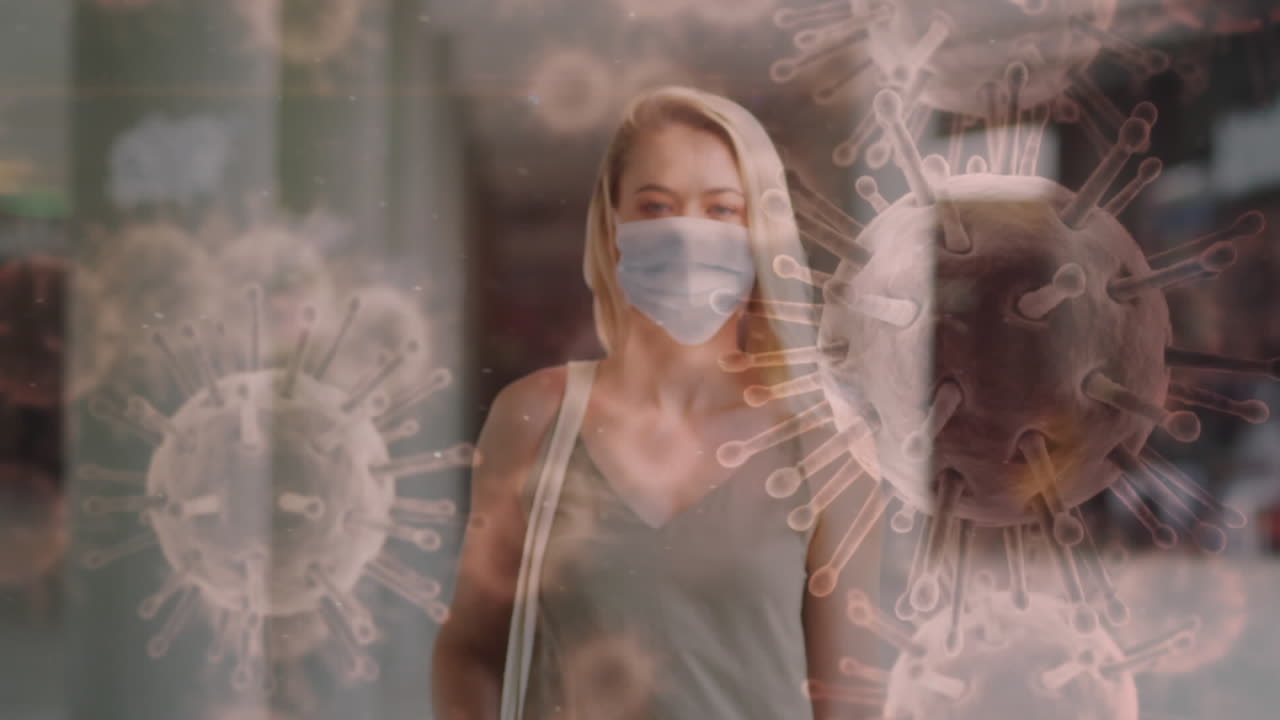 animación de células de covid-19 que se mueven sobre una mujer con máscara facial
