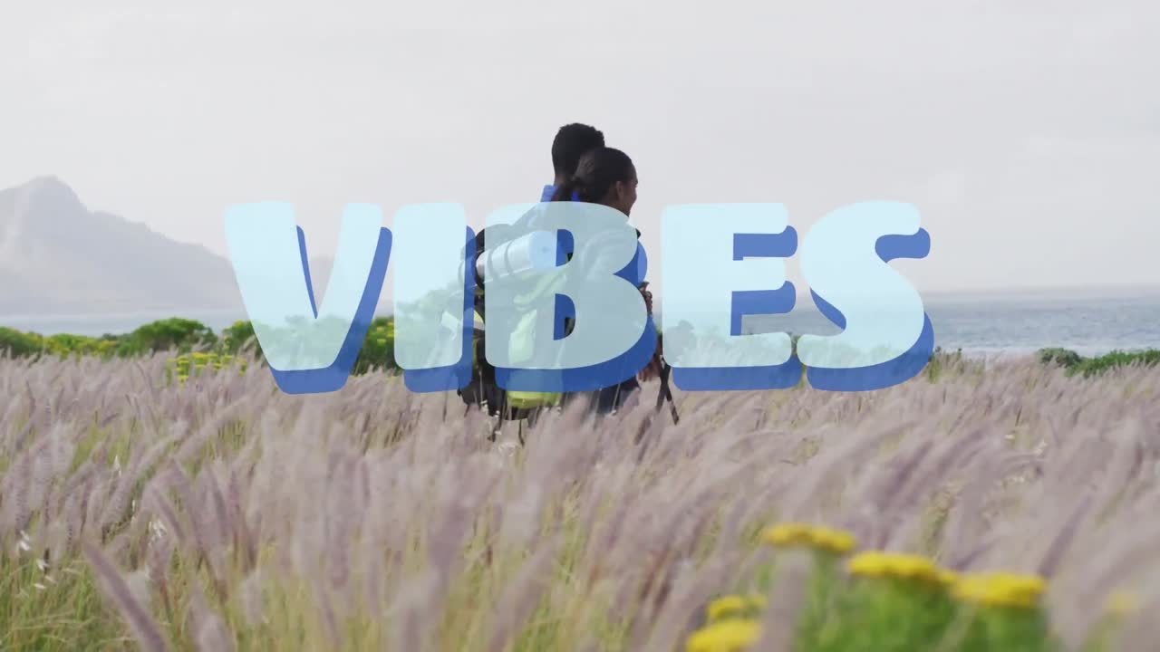animación de la palabra vibra escrita en azul sobre una pareja de senderismo en el campo
