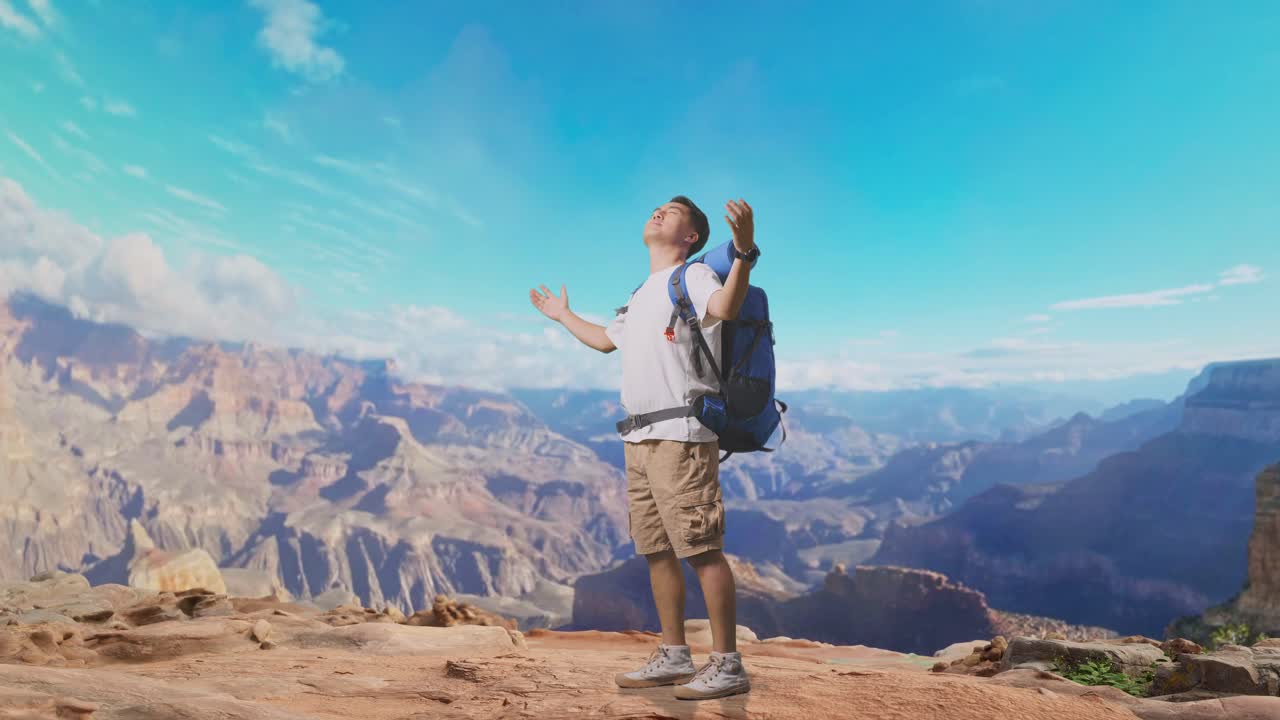 Full Body Side View Of Asian Male Hiker With Mountaineering Backpack Smiling And Spreading Arms Enjoy Looking The View Around While Traveling At The Top Of Mountain