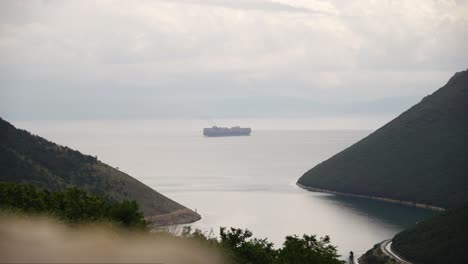 Cargo-ship-sailing-past-the-Plomin-channel-on-the-Adriatic-Sea