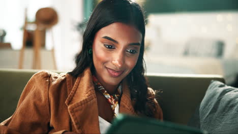 woman using tablet indoors