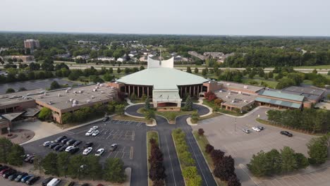Luxury-looking-entrance-to-Christian-church-in-Michigan,-aerial-drone-view