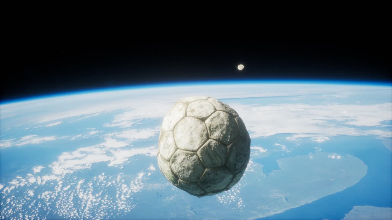 vieja pelota de fútbol en el espacio en órbita terrestre