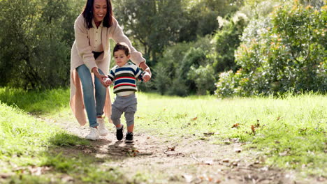 mother, child and walking outdoor at a park