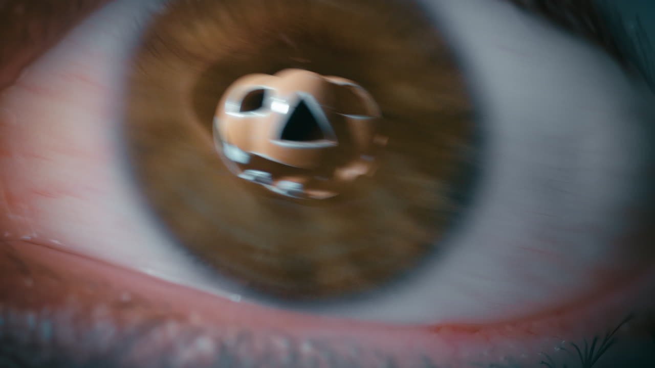 Scary Eye Sees Big Halloween Pumpkin in Pupil Macro