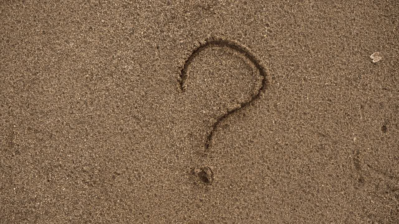 Video of woman drawing question mark