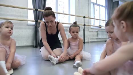 little girls preparing for ballet lesson