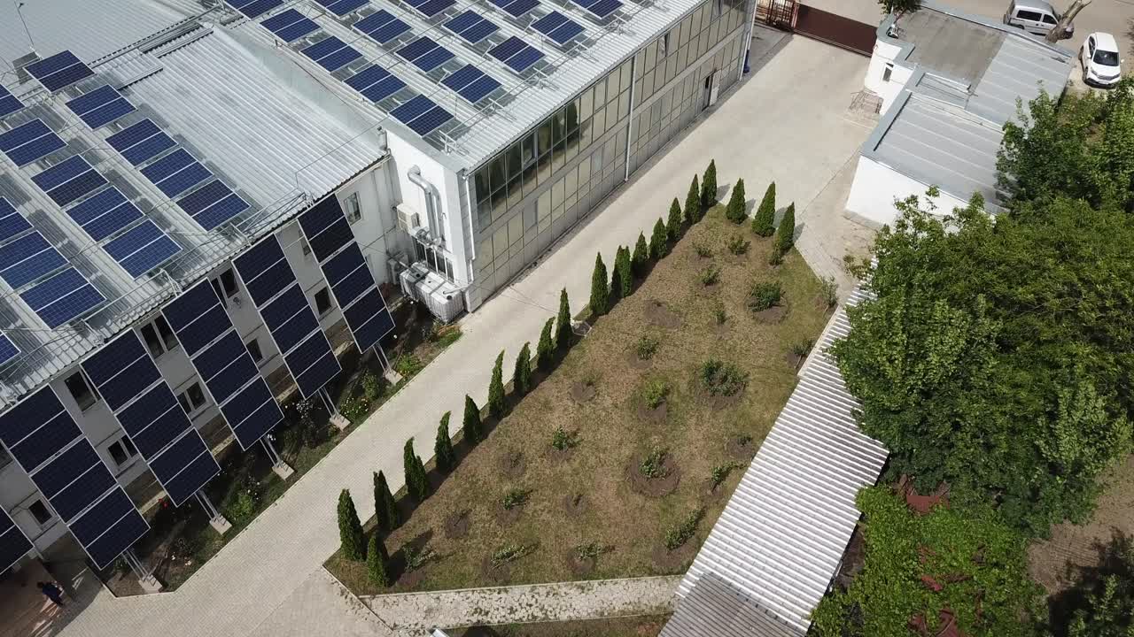 Eco Park Solar Installation, Aerial Tilt Down Shot Over Modern Offices