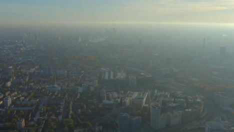 High-aerial-slider-shot-over-kings-cross-industrial-area-looking-towards-central-London