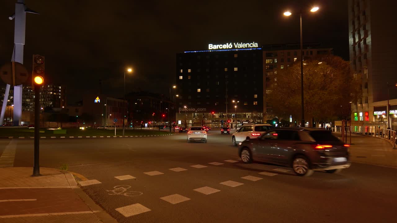 Night View of a Barcelona Intersection with Hotel