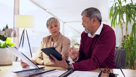 Collaboration,-man-and-woman-with-a-tablet