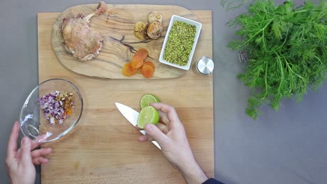 cutting lime in the kitchen cenital view