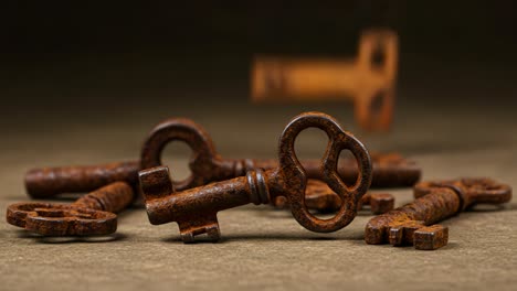exploring the intricacies of vintage keys: a close-up study on weathered metalwork and its timeless charm in a series of artistic frames
