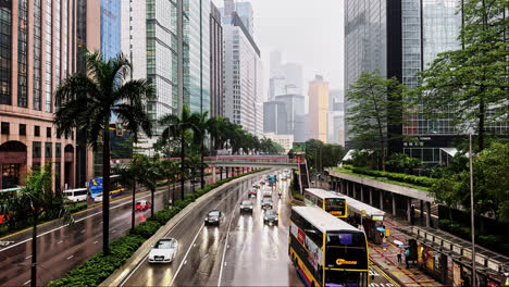 gloomy day traffic on wet gloucester road in hong kong captured in slow motion