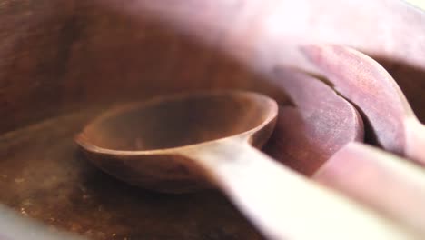 wooden spoon as a tool when serving traditional colombian food