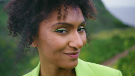 Closeup-smiling-woman-dancer-enjoy-performance-on-green-field.-Girl-dancing.