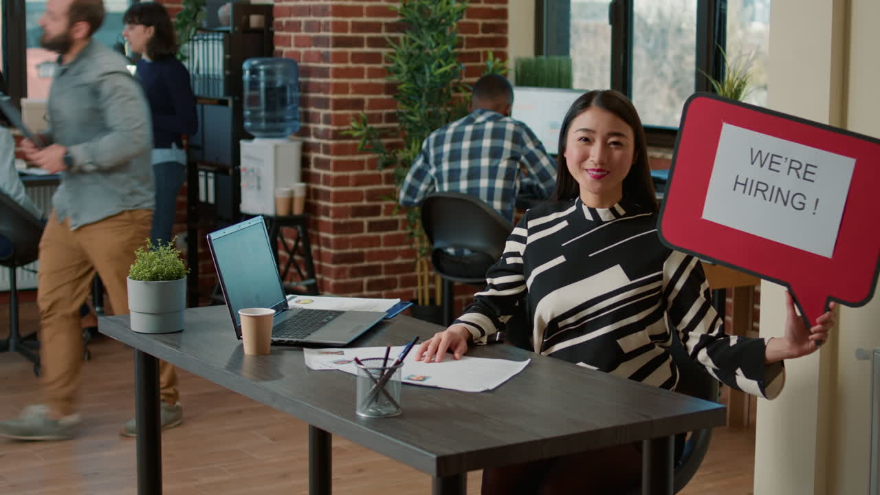 Portrait of HR employee holding speech bubble to advertise job offer