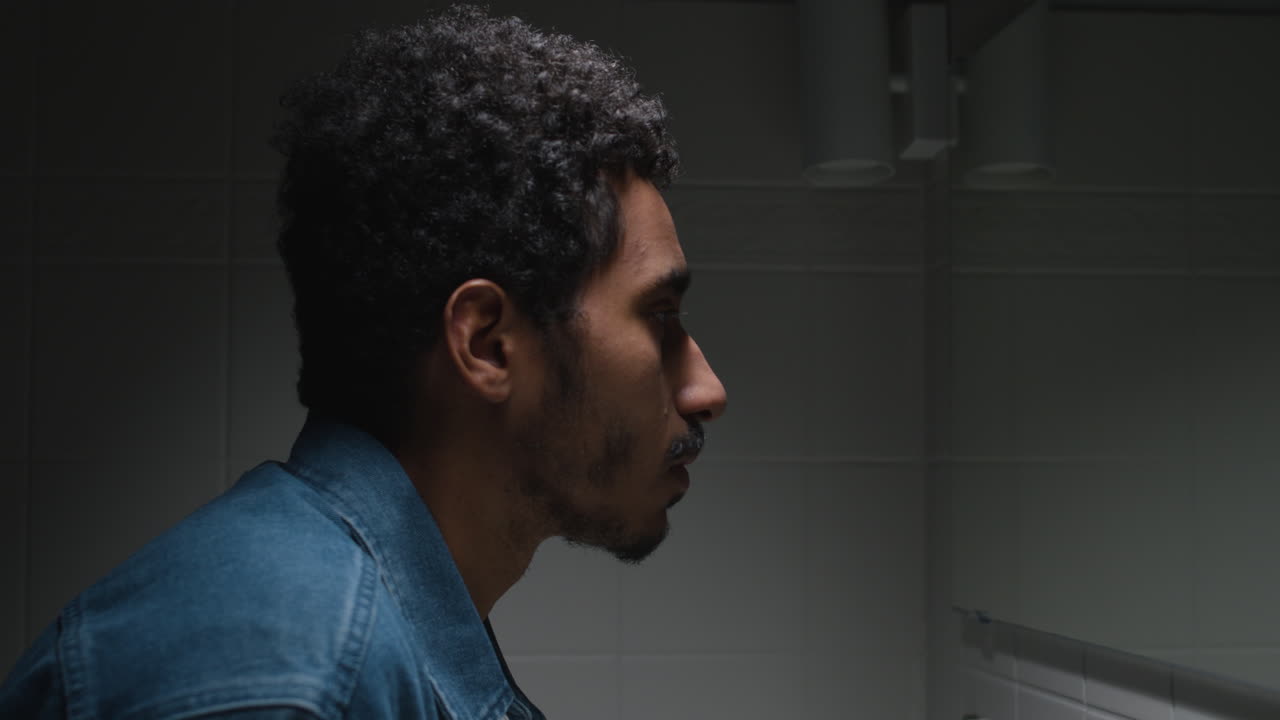 Man standing in the bathroom