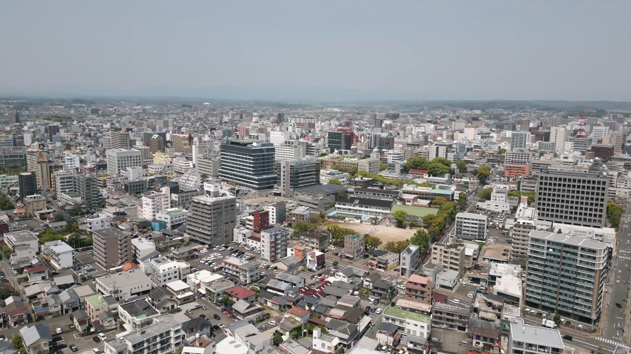 Aerial Scenic Drone Footage of the City of Miyazaki, Japan on a Sunny Day