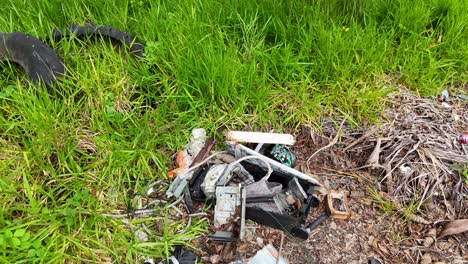 a 20-second video highlighting rubbish accumulation in a grassy area, emphasizing pollution and environmental concerns in gold coast, australia