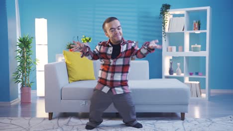 Young-man-with-dwarfism-dancing-excitedly-and-pleasantly-having-fun-at-home.