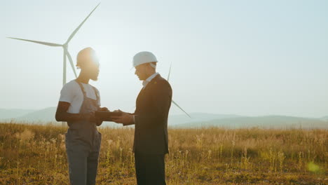 engineers discussing wind farm project