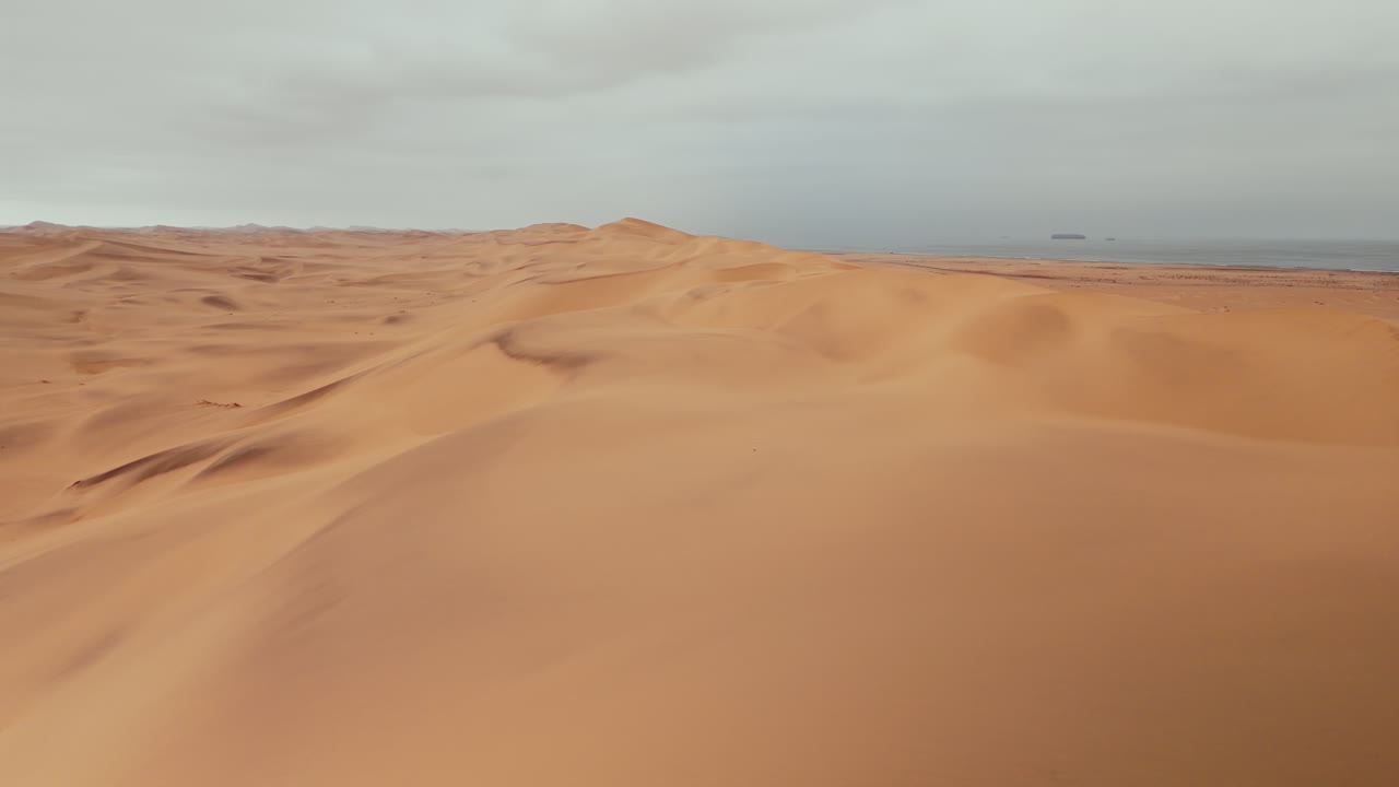 Desert Sand Dunes by the Ocean