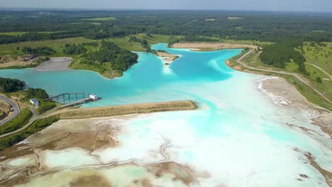 aerial view green nature and toxic nuclear lake in novosibirsk, russian maldives at daytime