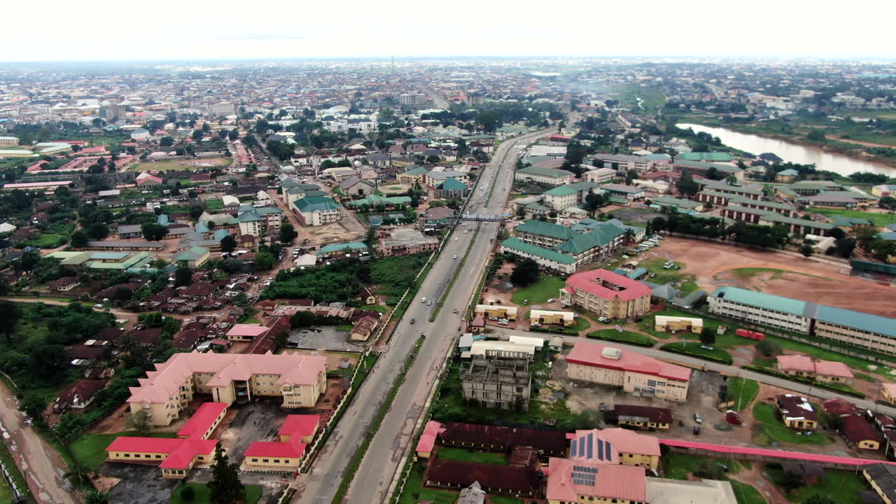The bustling and thriving city of Owerri Town in the Imo State of Nigeria - aerial view of the highway