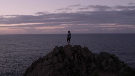 men standing on a clif