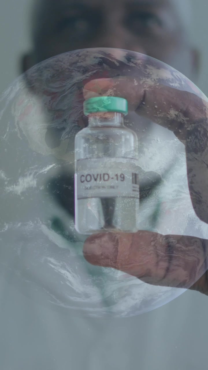 Animation of globe spinning with scientist holding covid-19 vaccine