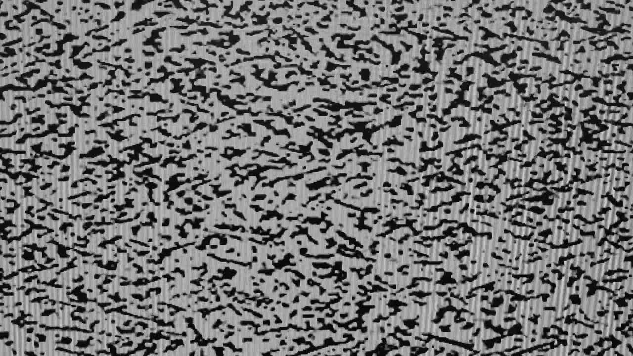 White noise on the old television, no channels work during a pandemic
