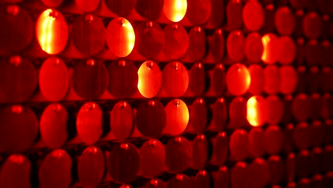 Abstract red kinetic glitter wall moving. Sparkles shining reflective background. Night club decoration. Can be used as transitions, added to modern projects,art backgrounds.