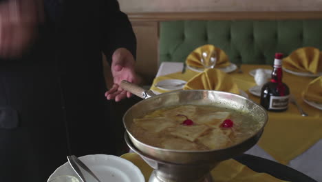 chef preparing crepe suzette