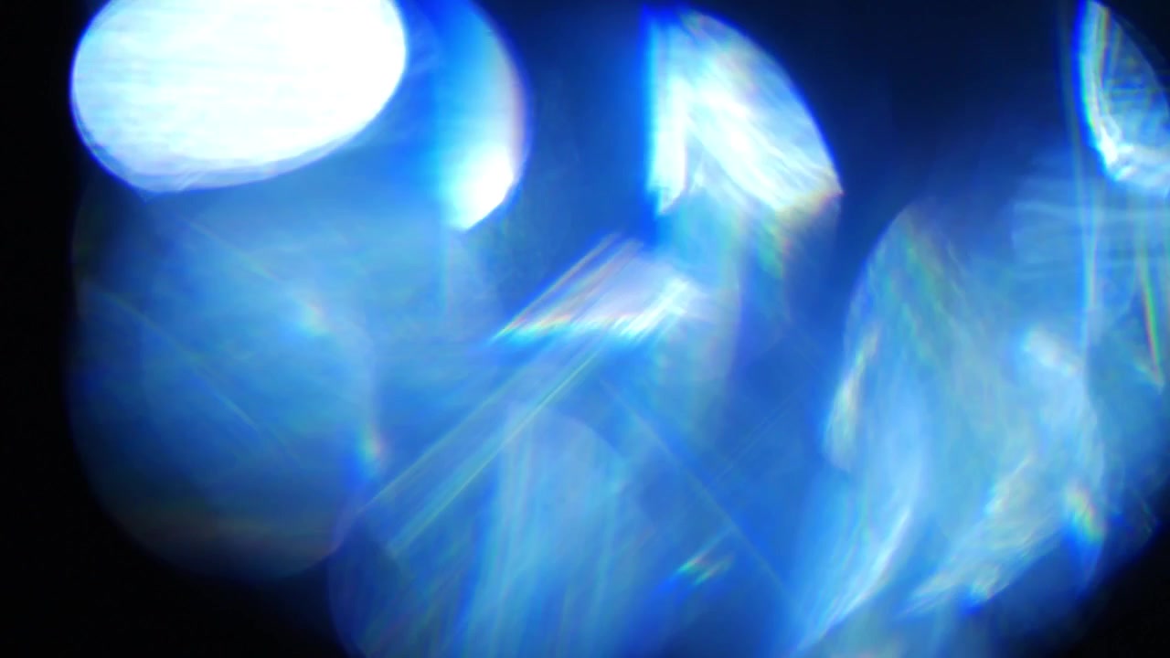 Dynamic Blue Light Leaks and Bokeh Overlay Effect