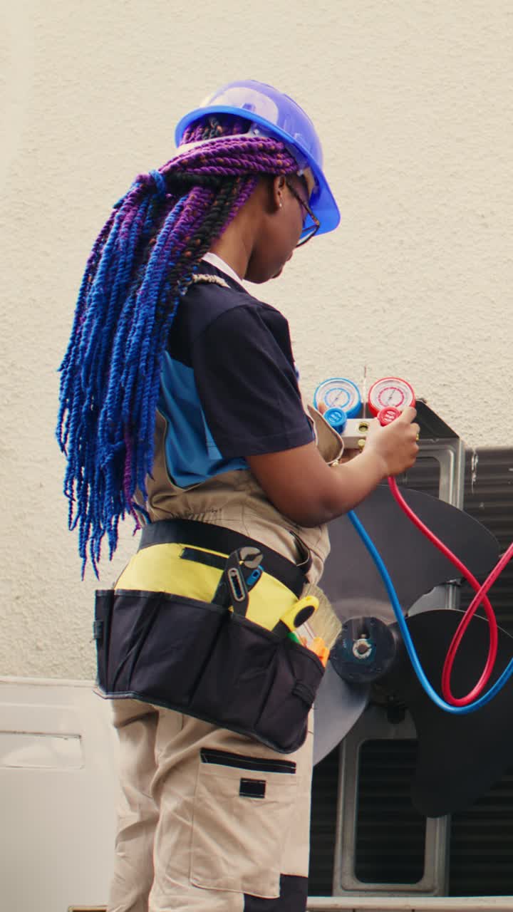 Vertical video Expert looking at refrigerant levels
