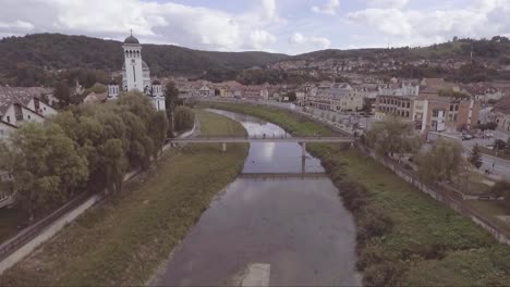 Aerial-over-a-church-in-Sighisoara-Castrum-Sex-in-Romania-birthplace-of-Dracula-2