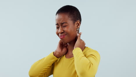 Woman,-neck-pain-and-injury-in-studio-with-stress